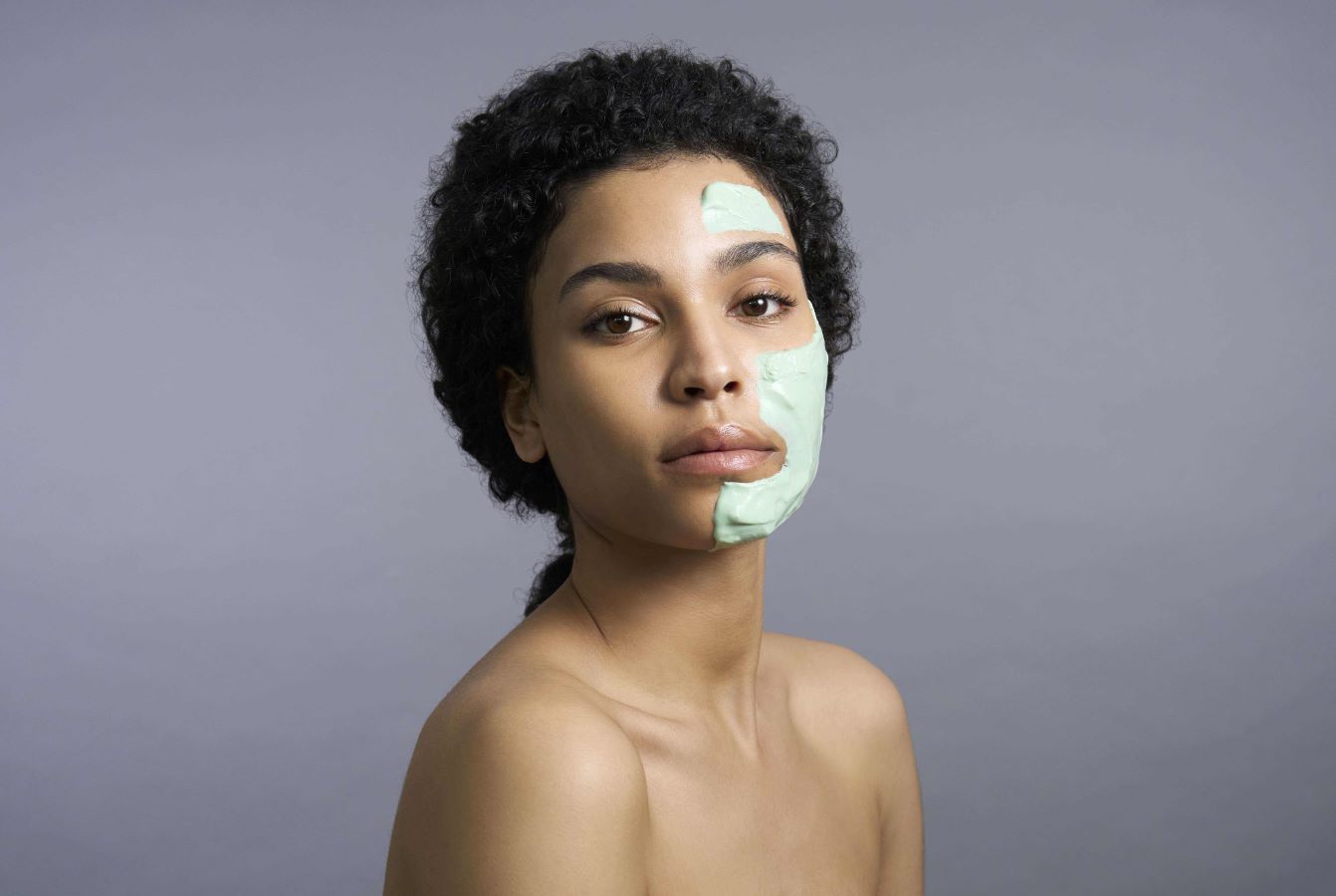 woman with a comfort zone face mask to purify her skin